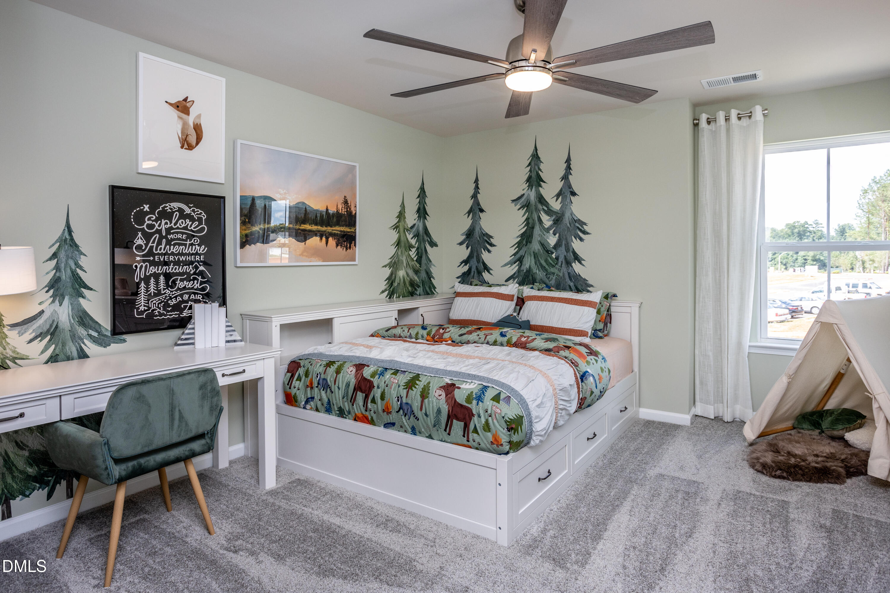 657 Ben Ledi Court Raleigh, NC 27603 - Photo 17 of 32 a bedroom with a bed a couch and a window