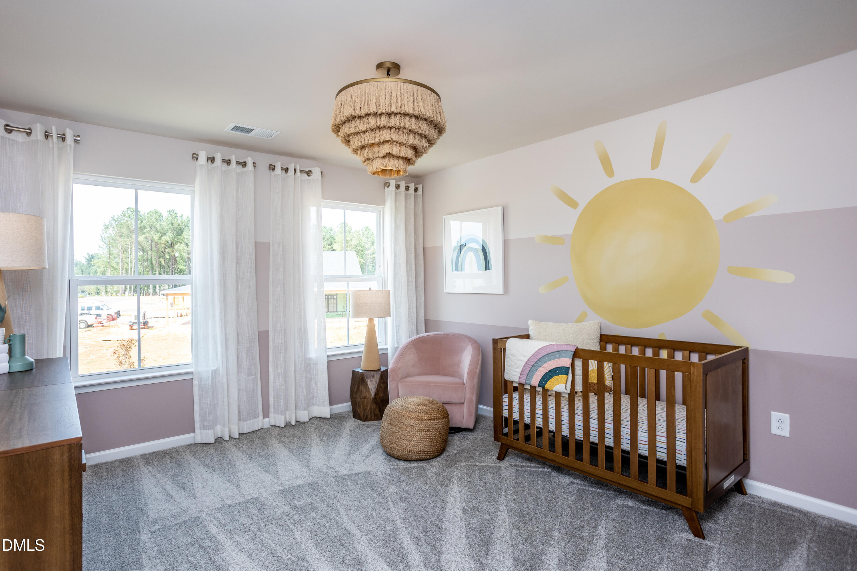 657 Ben Ledi Court Raleigh, NC 27603 - Photo 19 of 32 a bedroom with a bed and a window
