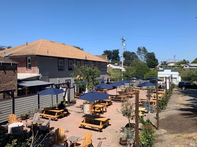 a view of a chairs and table in the terrace