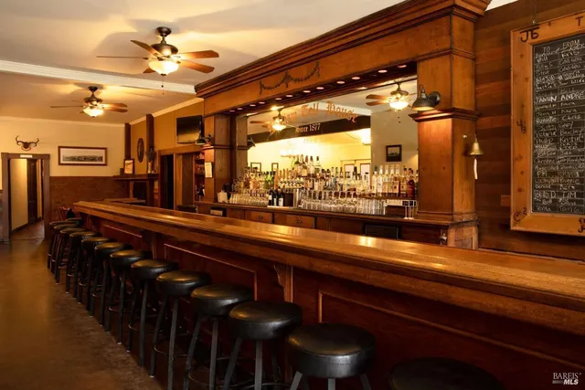 a bathroom with a sink and a large mirror
