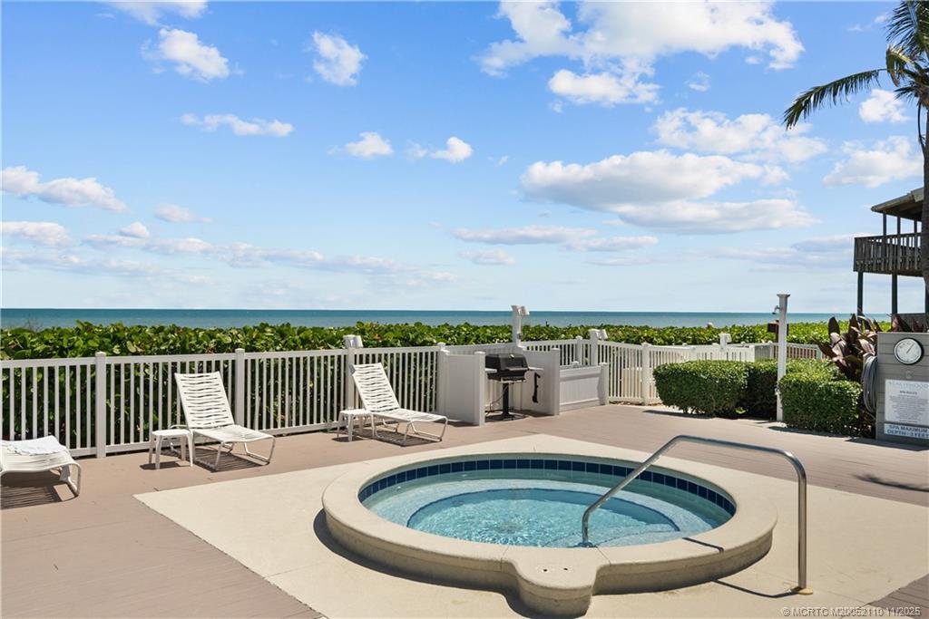 2355 Northeast Ocean Boulevard, Unit 120B Stuart, FL 34996 - Photo 18 of 26 a view of a swimming pool with a terrace