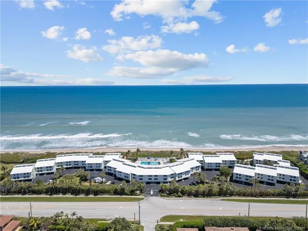 a view of a city and ocean