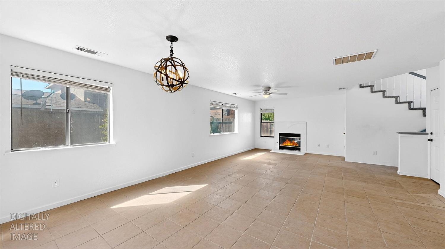 3632 La Mancha Place Turlock, CA 95382 - Photo 11 of 31 a view of empty room with windows