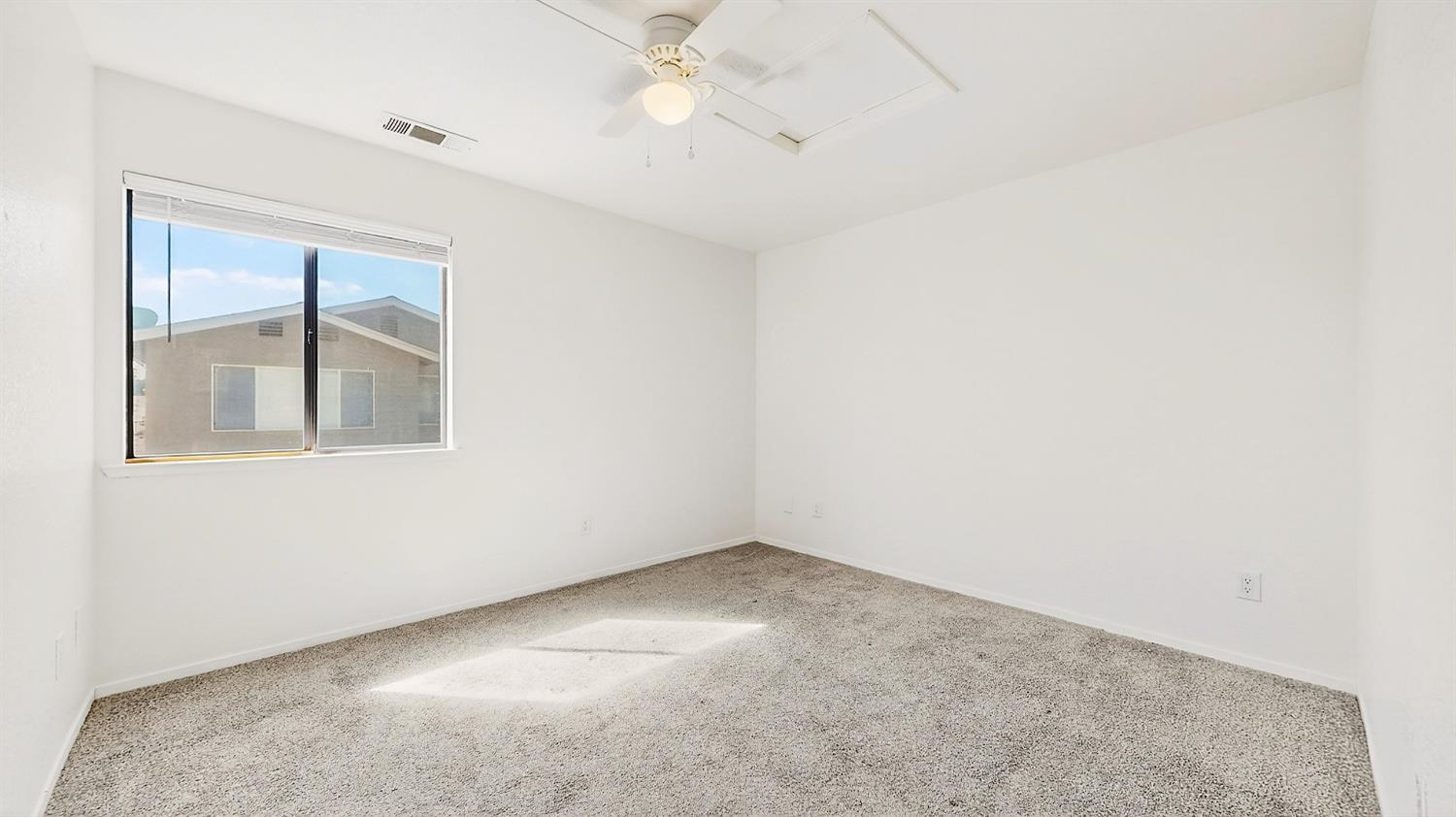 3632 La Mancha Place Turlock, CA 95382 - Photo 18 of 31 an empty room with a window