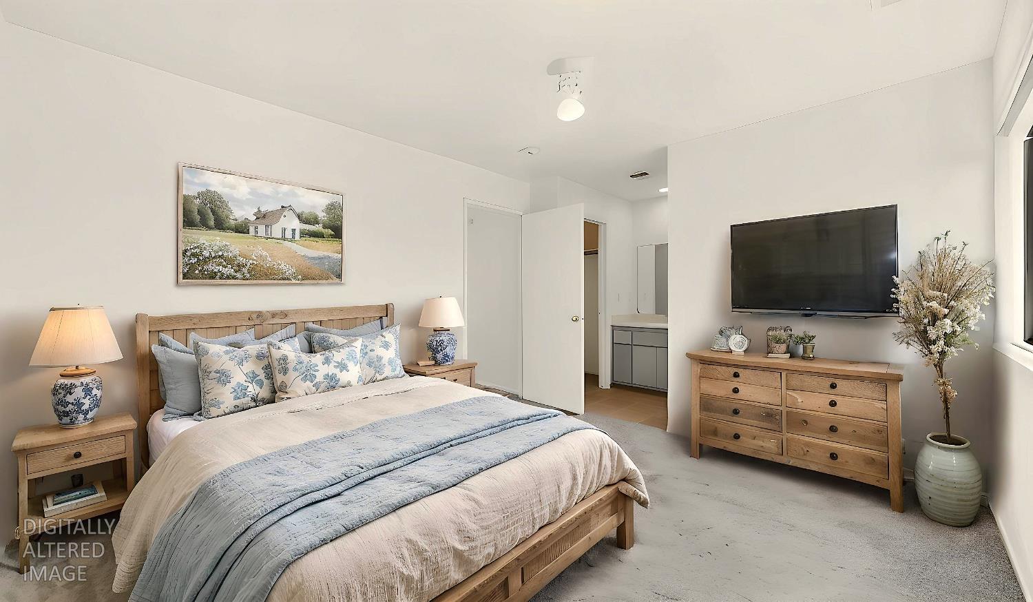 3632 La Mancha Place Turlock, CA 95382 - Photo 19 of 31 a bedroom with bed and tv on the dresser