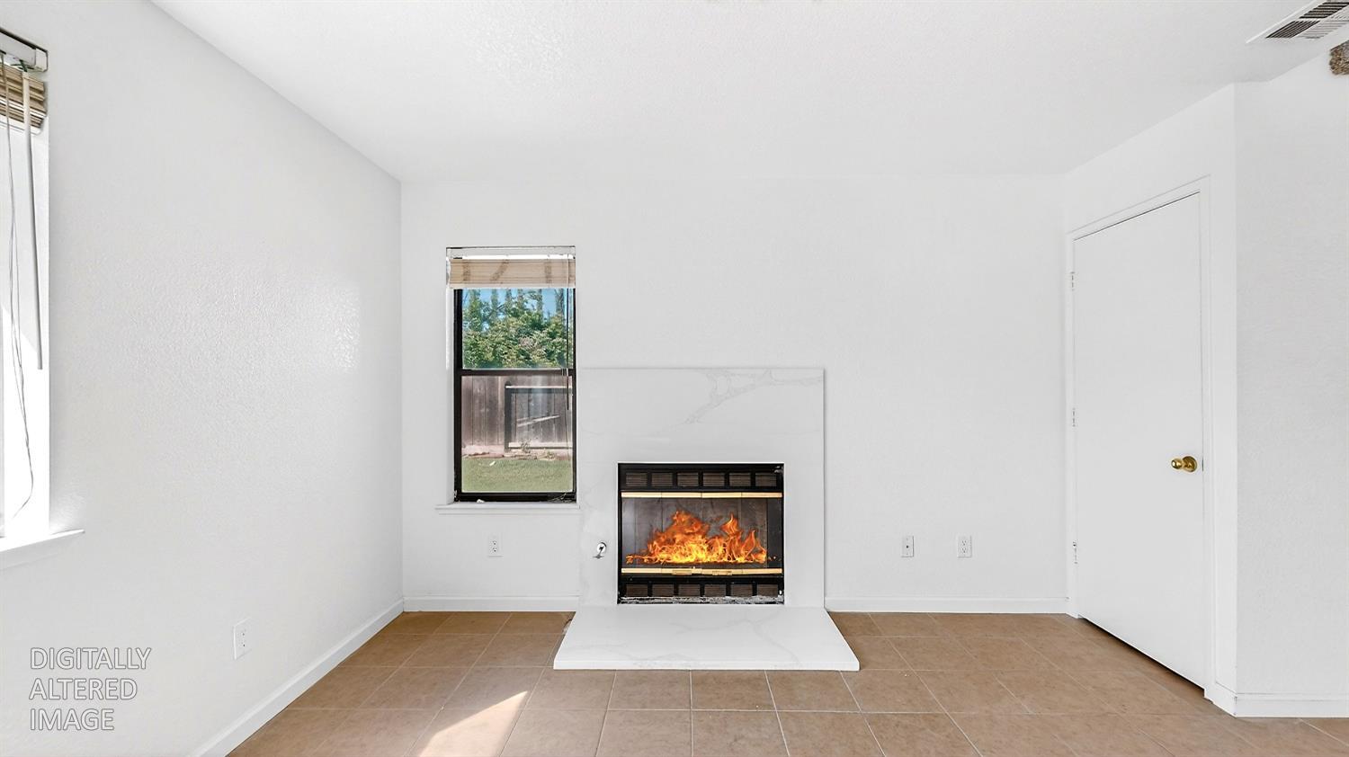 3632 La Mancha Place Turlock, CA 95382 - Photo 7 of 31 a view of an empty room and window