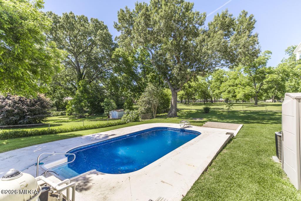 3710 Sandy Circle Macon, GA 31216 - Photo 42 of 44 a view of a swimming pool with a yard