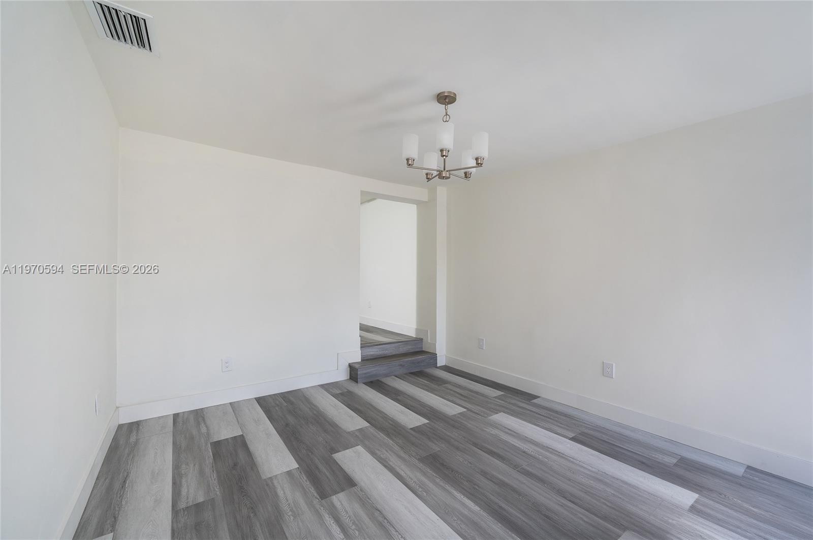 2433 Northwest 97th Street Miami, FL 33147 - Photo 11 of 41 a view of room with empty racks