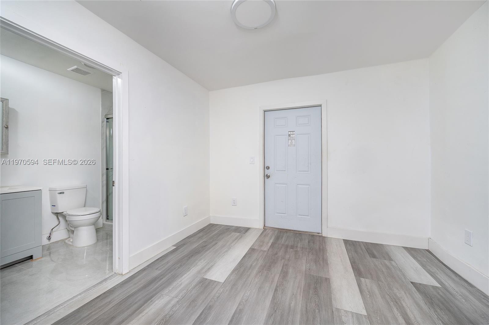 2433 Northwest 97th Street Miami, FL 33147 - Photo 31 of 41 a view of bathroom with toilet