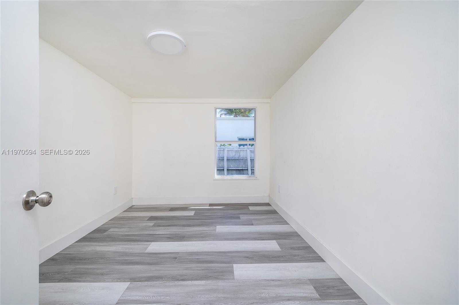 2433 Northwest 97th Street Miami, FL 33147 - Photo 35 of 41 a view of an empty room