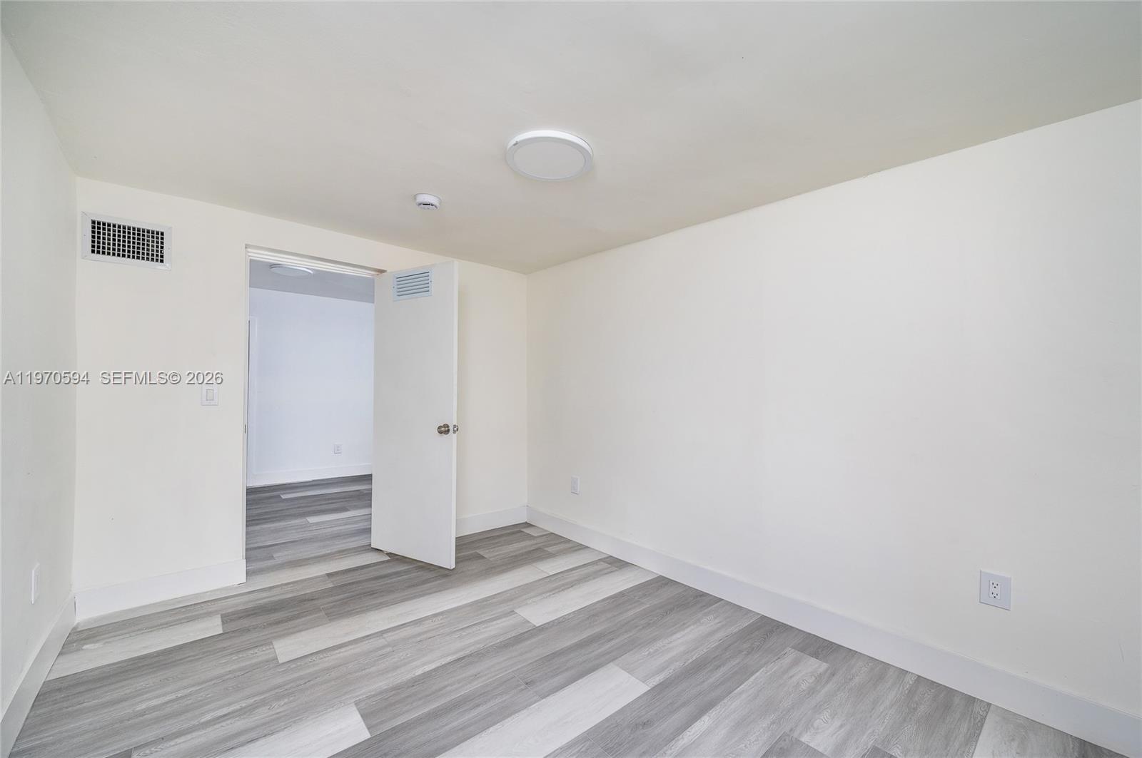 2433 Northwest 97th Street Miami, FL 33147 - Photo 36 of 41 a view of empty room