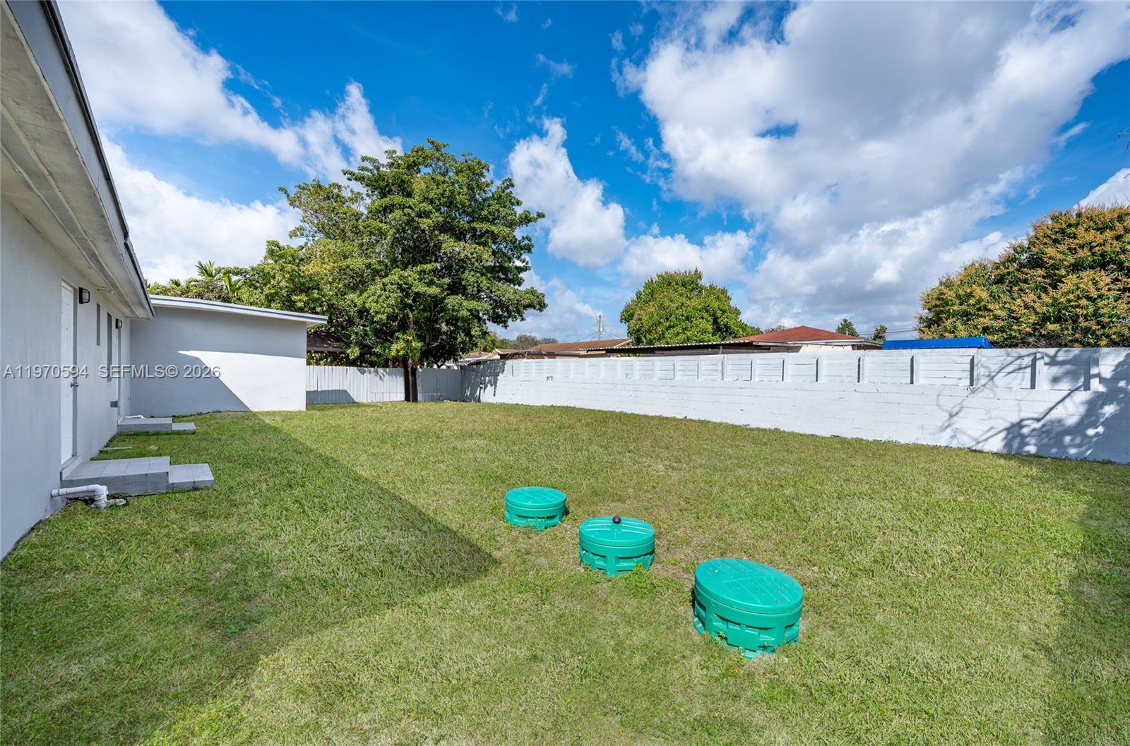 2433 Northwest 97th Street Miami, FL 33147 - Photo 5 of 41 a view of a back yard