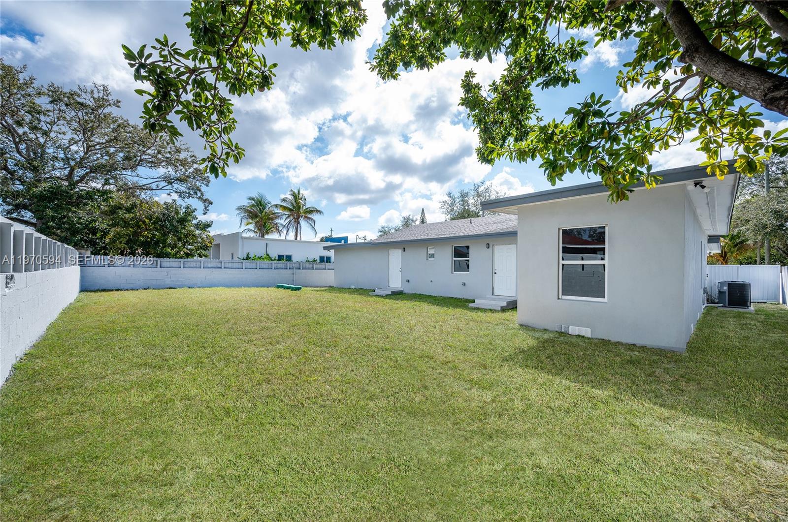 2433 Northwest 97th Street Miami, FL 33147 - Photo 7 of 41 a house view with swimming pool