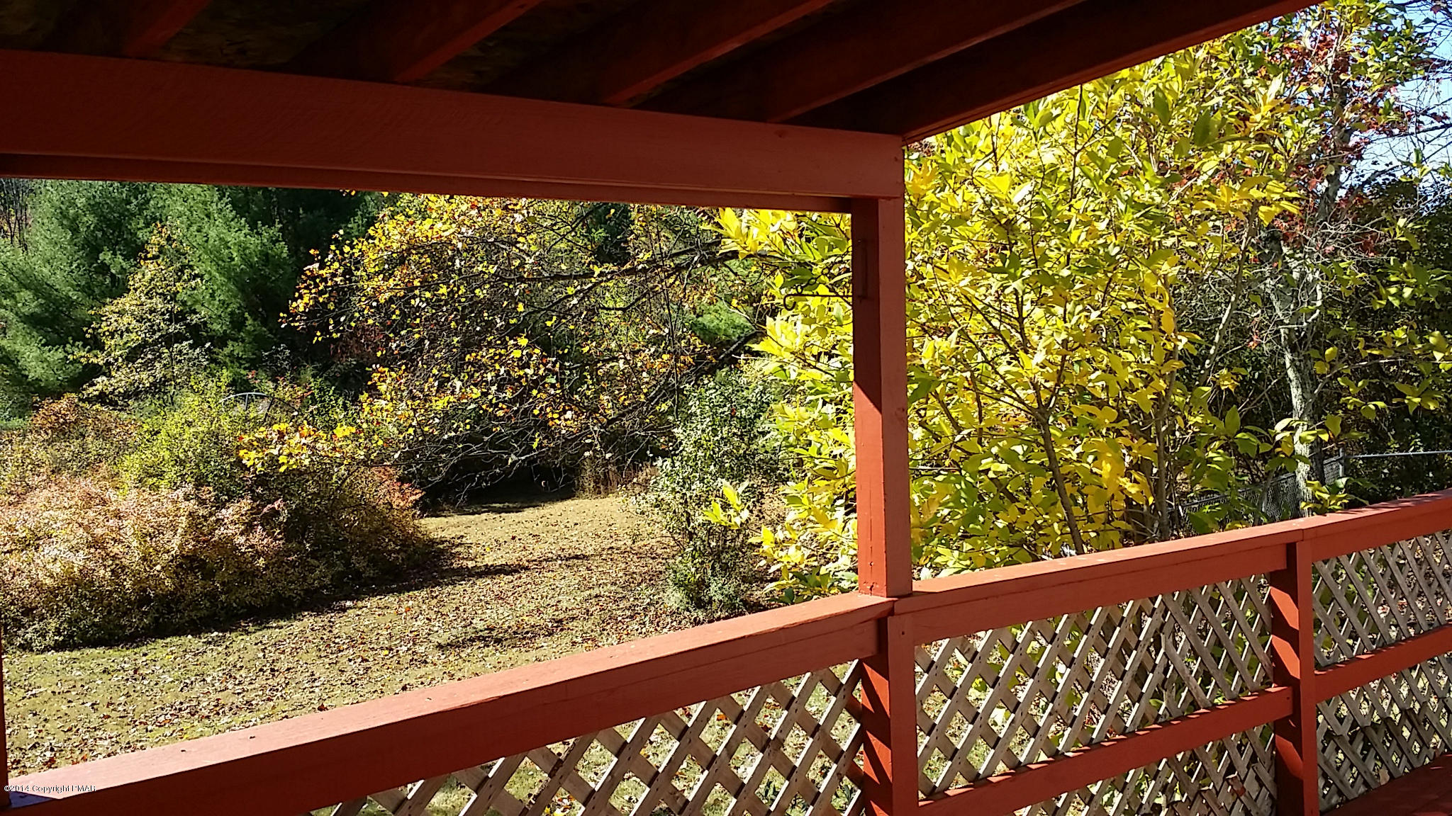 5523 Neola Road Stroudsburg, PA 18360 - Photo 12 of 23 a view of a forest from a balcony