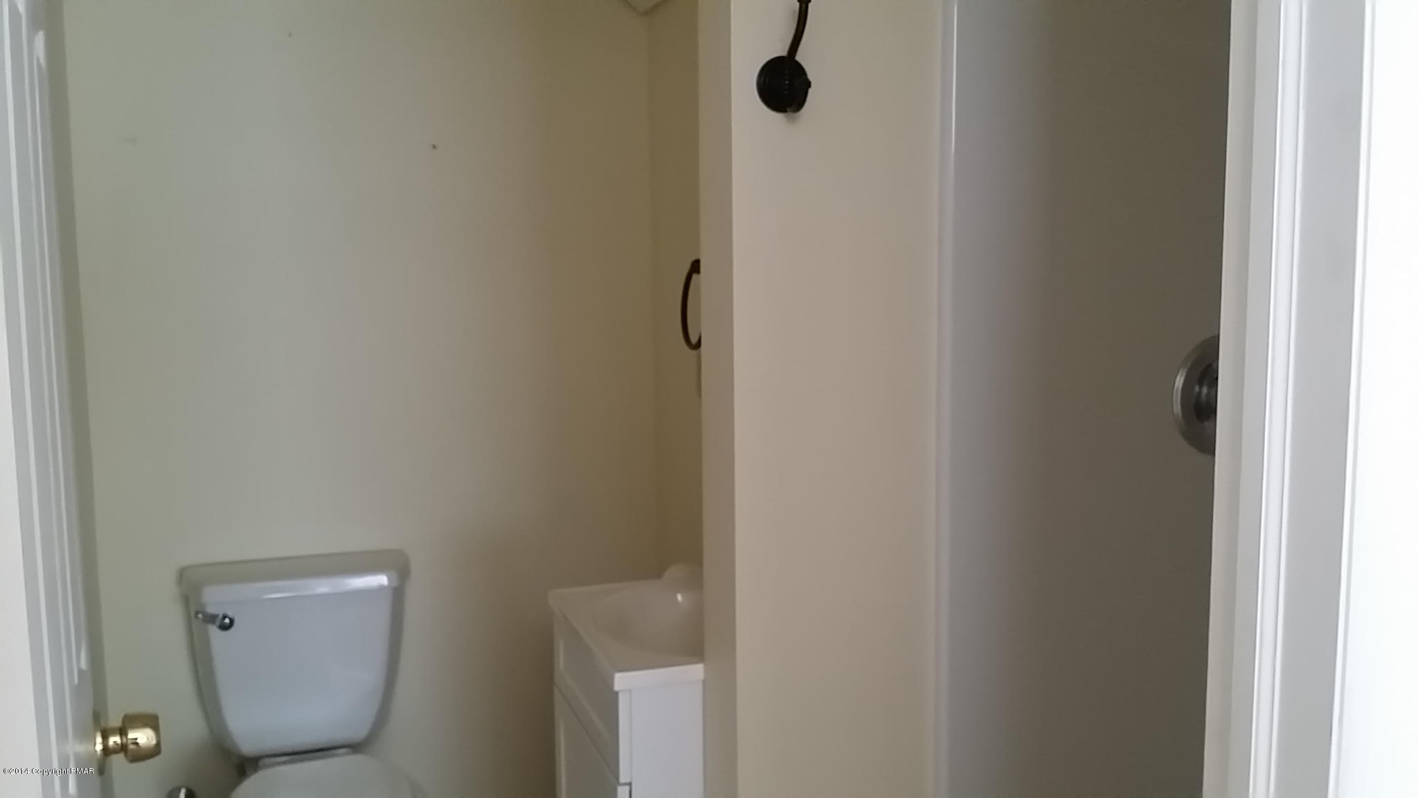 5523 Neola Road Stroudsburg, PA 18360 - Photo 18 of 23 a bathroom with a toilet and a shower