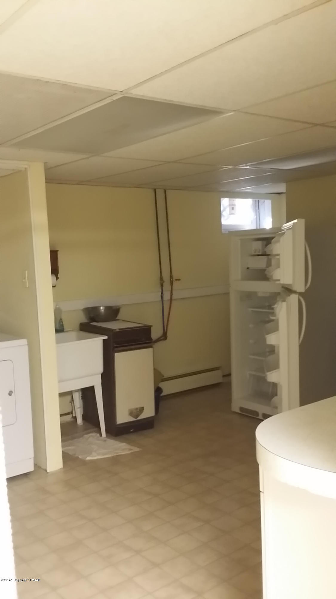 5523 Neola Road Stroudsburg, PA 18360 - Photo 20 of 23 a bathroom with a sink a toilet and a shower