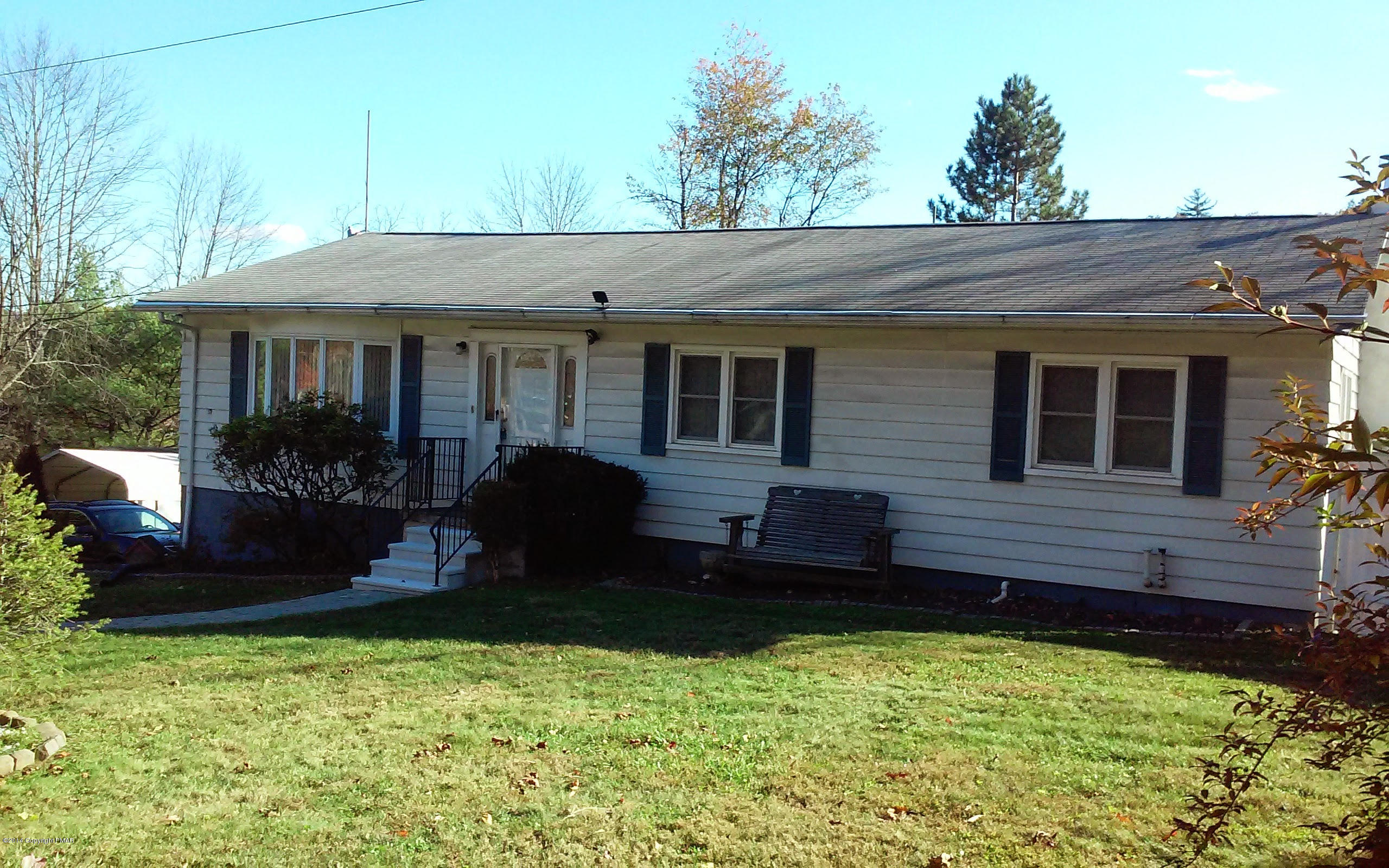 5523 Neola Road Stroudsburg, PA 18360 - Photo 2 of 23 a house view with a garden space