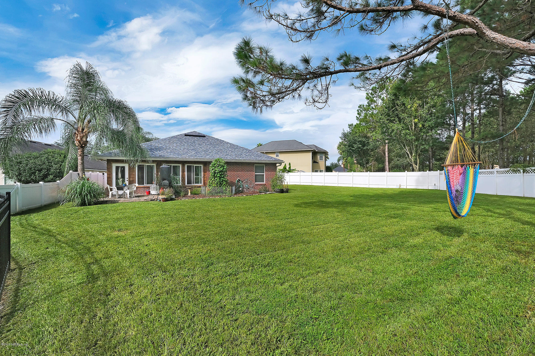 651 Timbermill Lane Orange Park, FL 32065 - Photo 29 of 34 a view of a house with a backyard and a garden