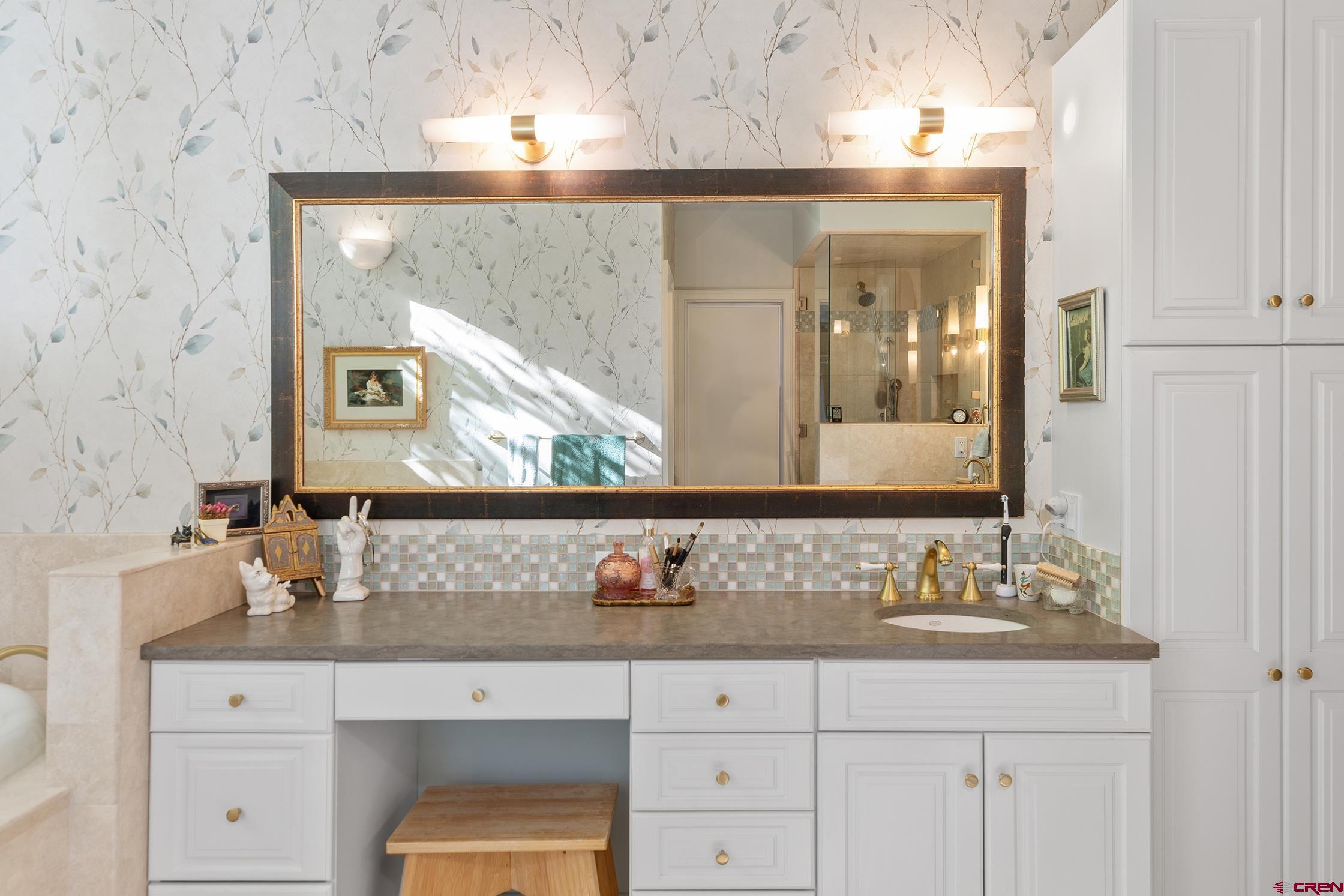 721 East Columbia Avenue Telluride, CO 81435 - Photo 16 of 44 a bathroom with mirror sink and vanity