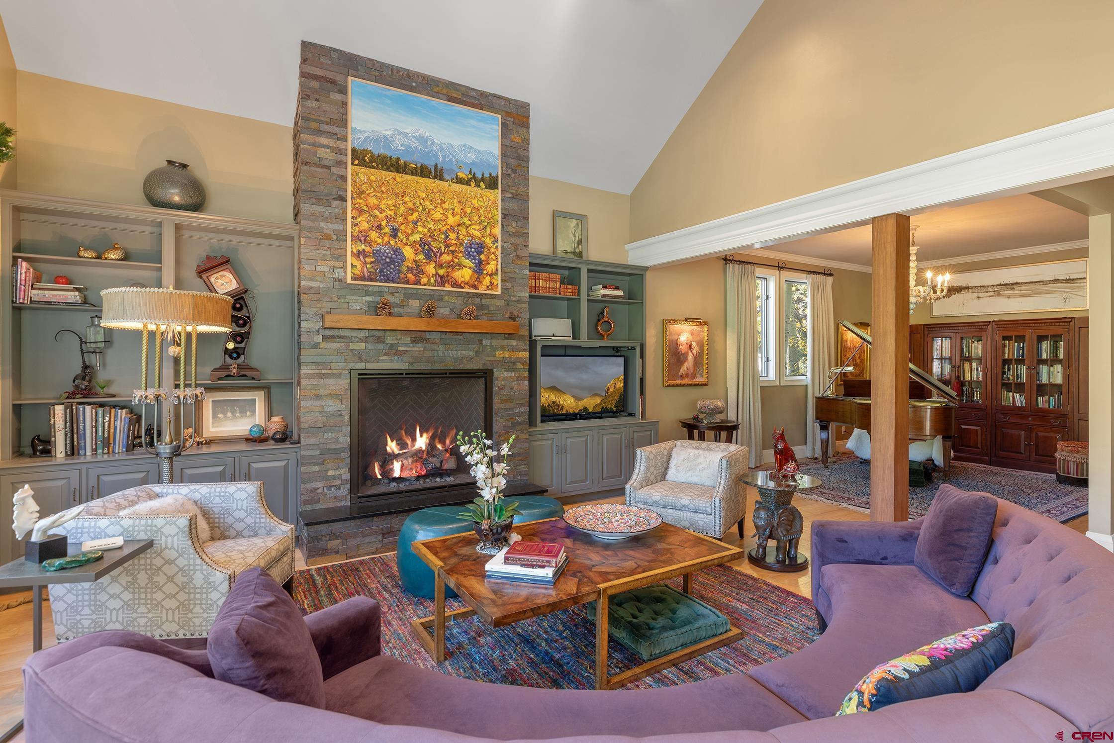 721 East Columbia Avenue Telluride, CO 81435 - Photo 2 of 44 a living room with furniture fireplace and a large window