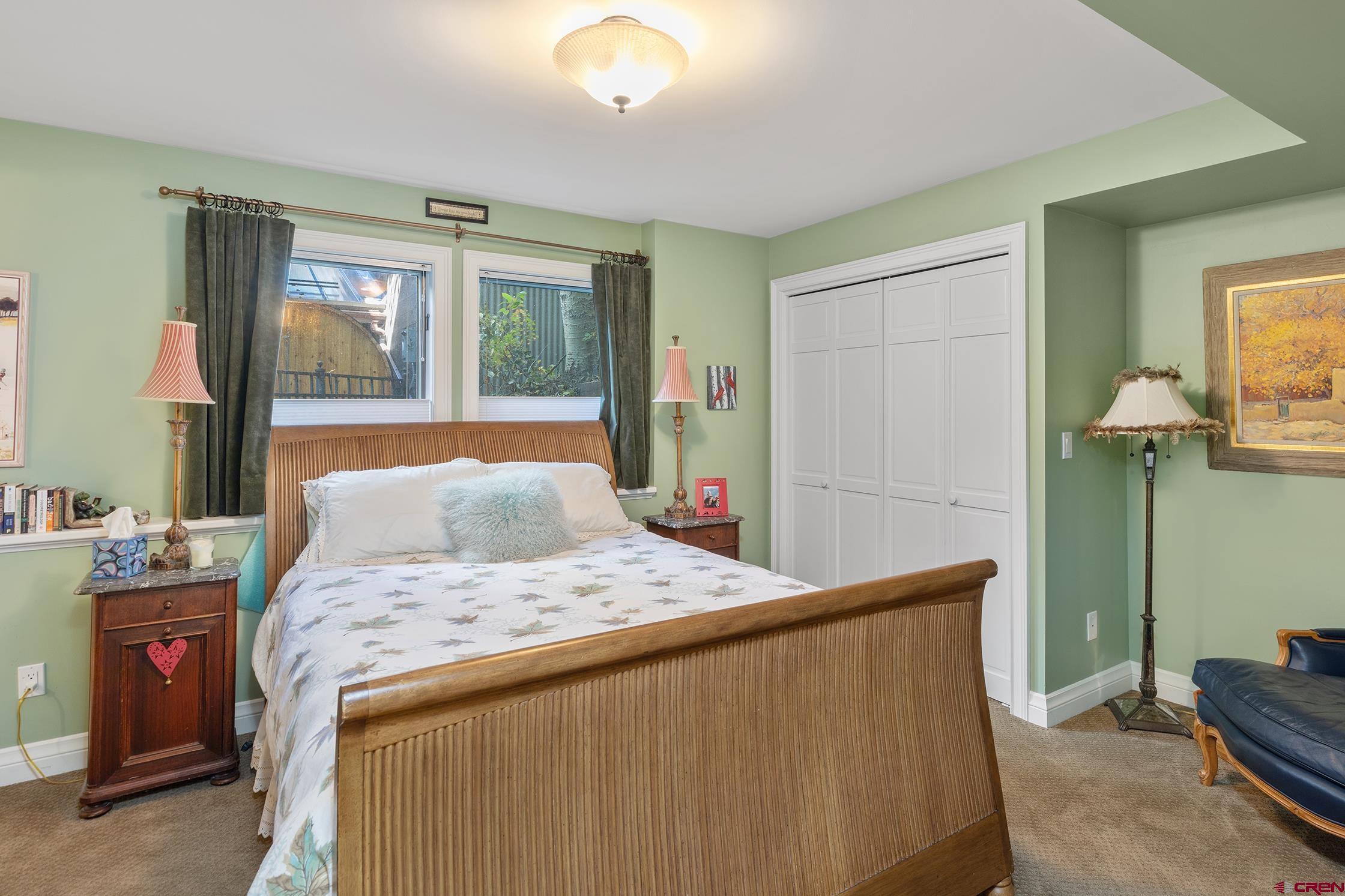 721 East Columbia Avenue Telluride, CO 81435 - Photo 27 of 44 a bedroom with a bed and a dresser