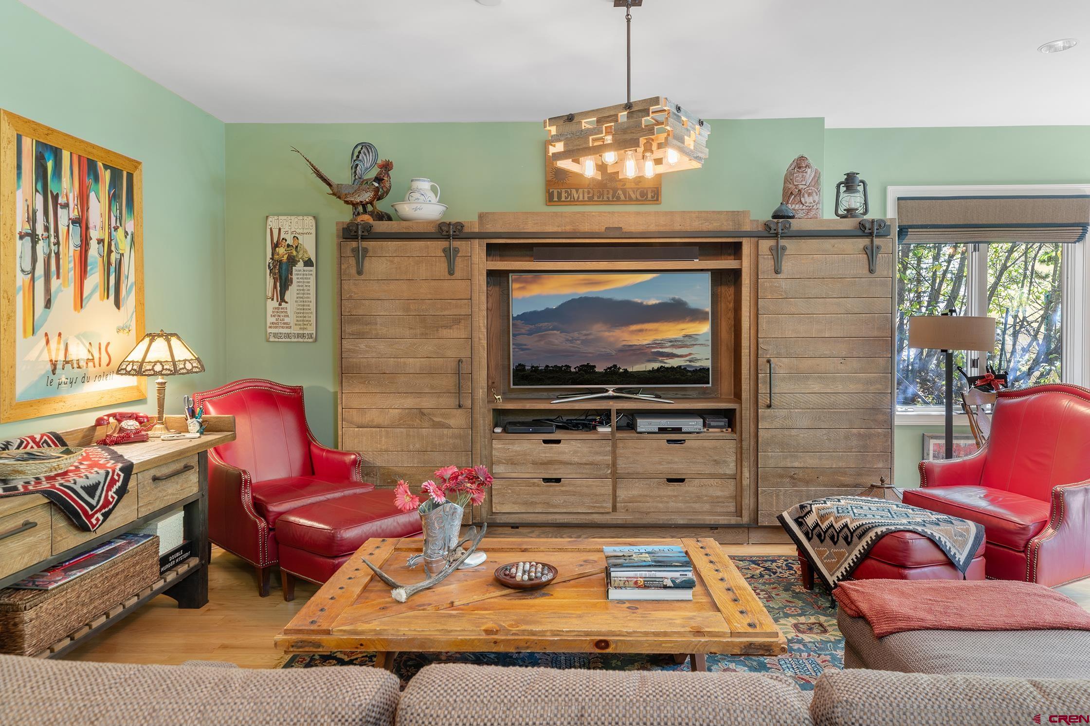 721 East Columbia Avenue Telluride, CO 81435 - Photo 35 of 44 a living room with furniture and a flat screen tv