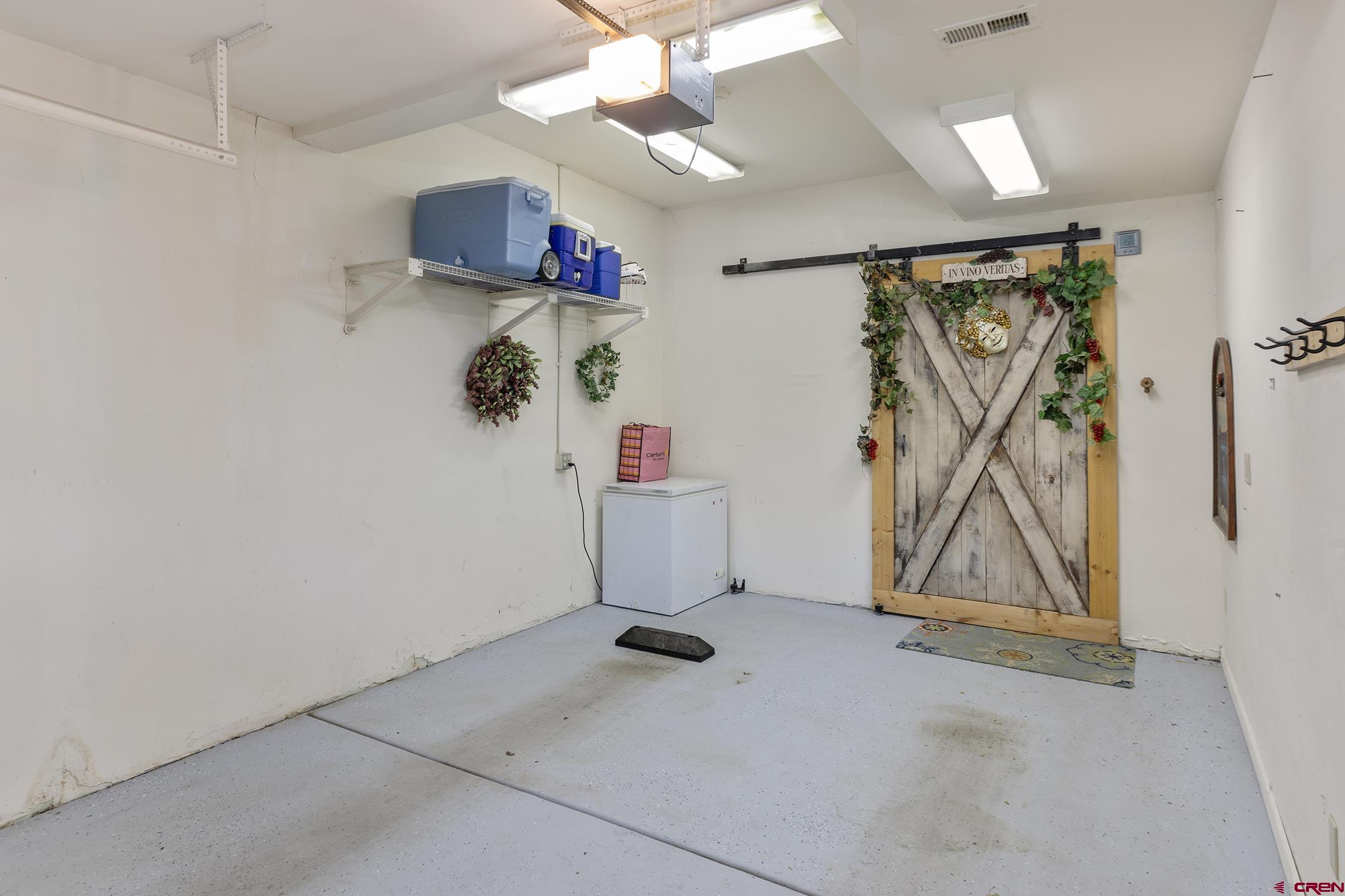 721 East Columbia Avenue Telluride, CO 81435 - Photo 44 of 44 wooden floor in a room with ceiling fan
