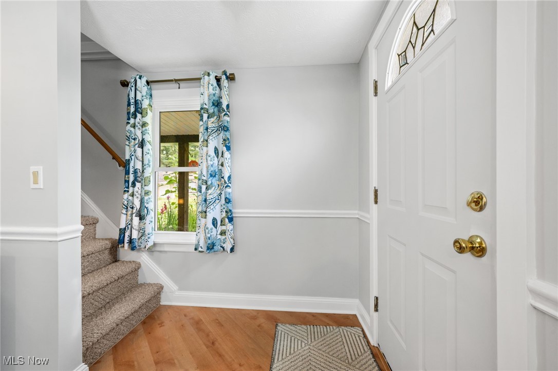3945 Columbia Road Medina, OH 44256 - Photo 17 of 40 Foyer with wood finished floors and stairway
