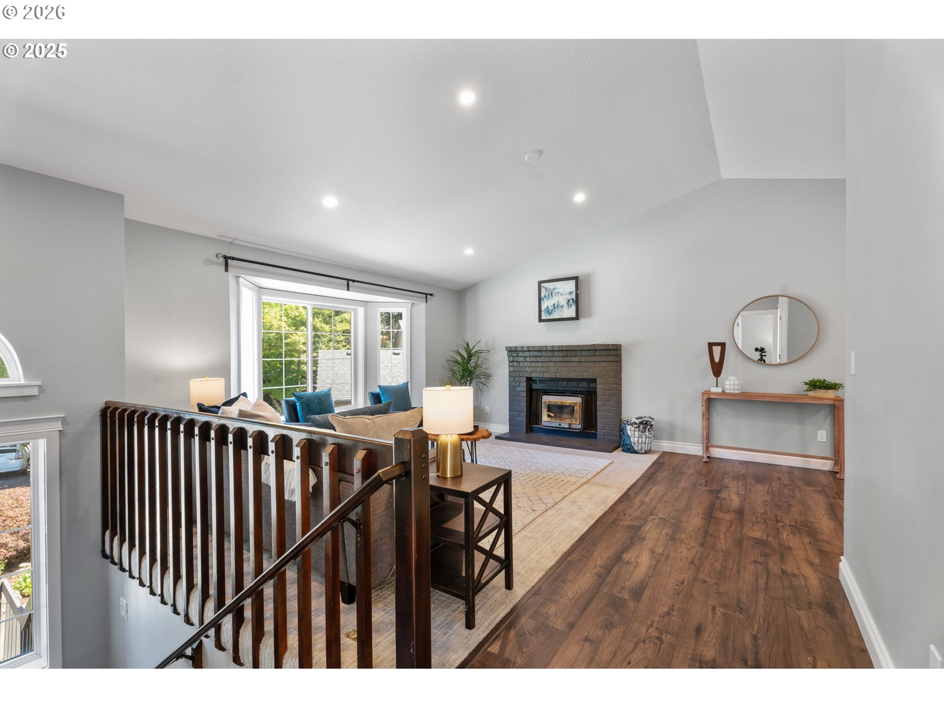 31150 Southwest Wallowa Court Wilsonville, OR 97070 - Photo 12 of 43 a living room with furniture and a fireplace
