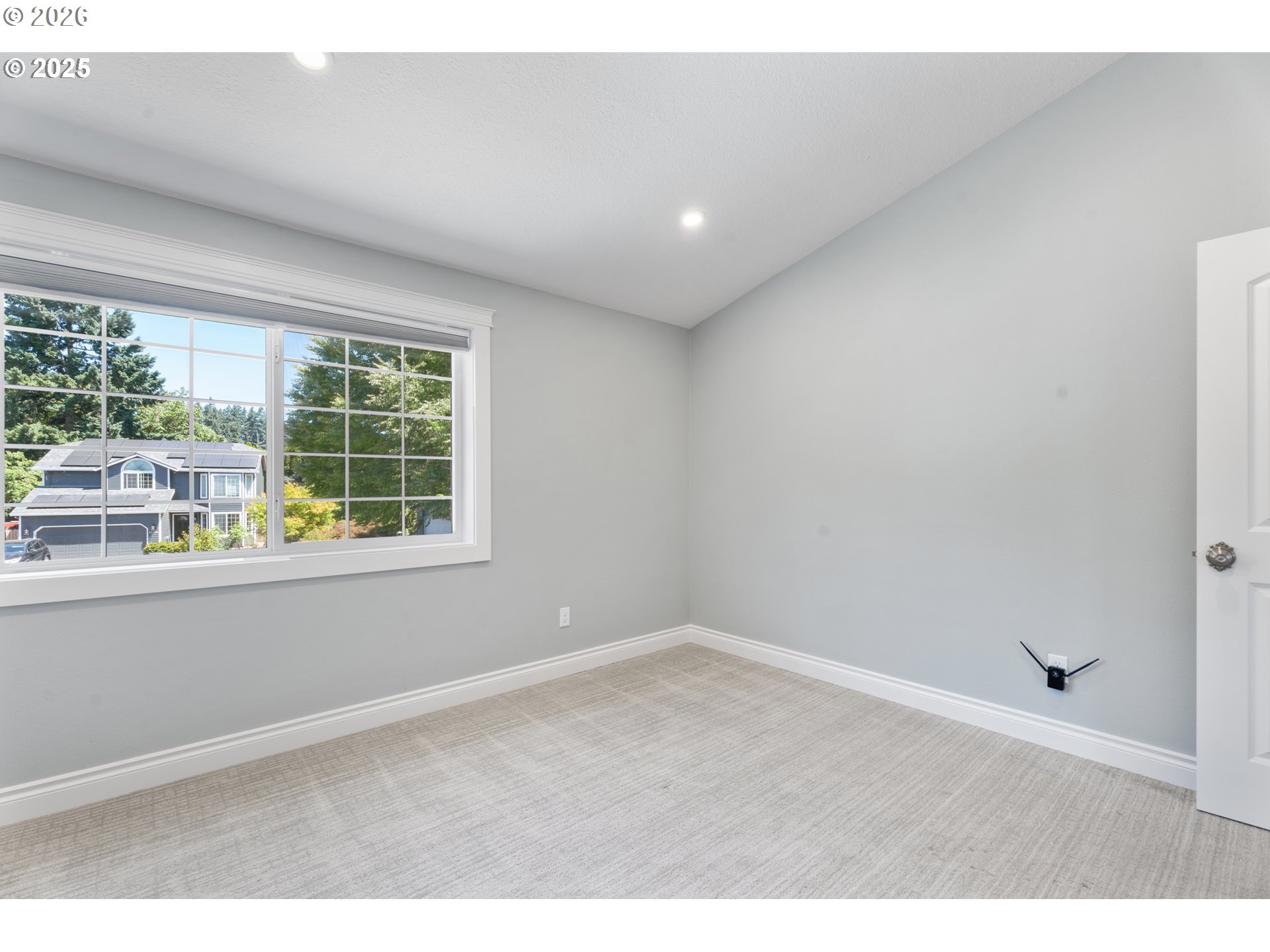 31150 Southwest Wallowa Court Wilsonville, OR 97070 - Photo 13 of 43 an empty room with wooden floor and windows
