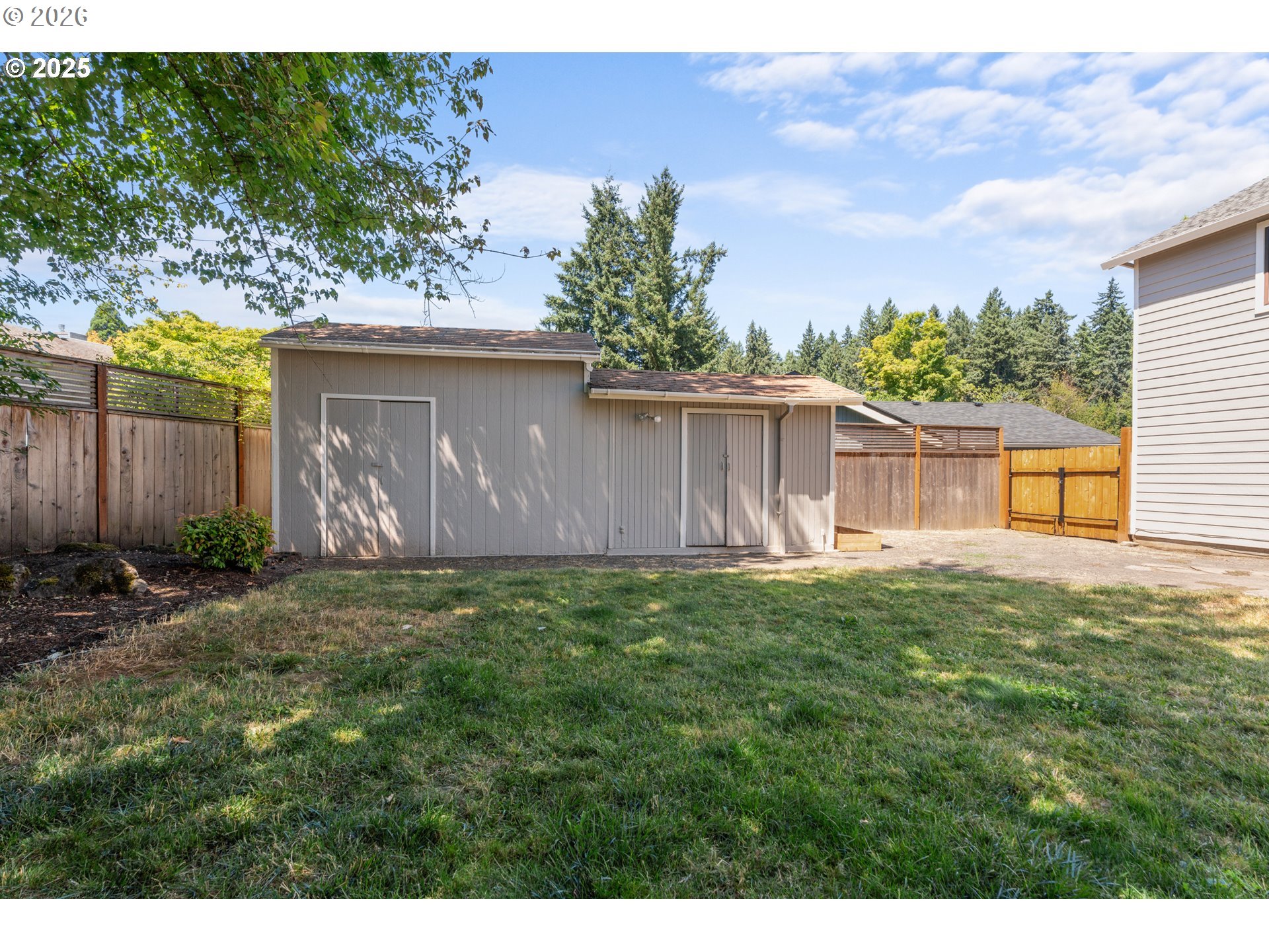 31150 Southwest Wallowa Court Wilsonville, OR 97070 - Photo 27 of 43 a backyard of a house with lots of green space