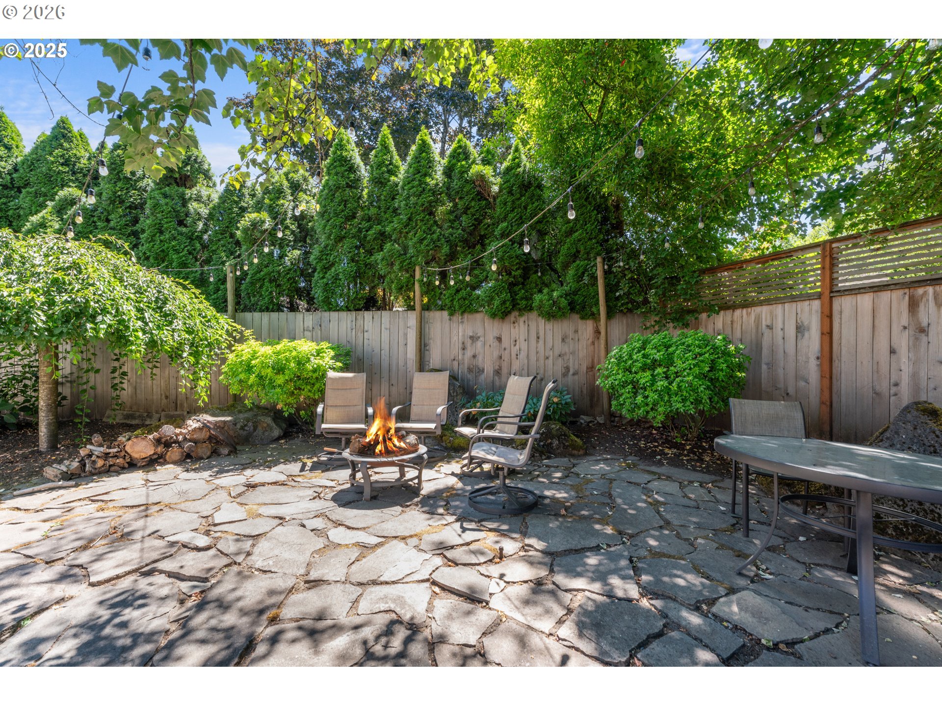 31150 Southwest Wallowa Court Wilsonville, OR 97070 - Photo 30 of 43 a view of a backyard with plants and chairs