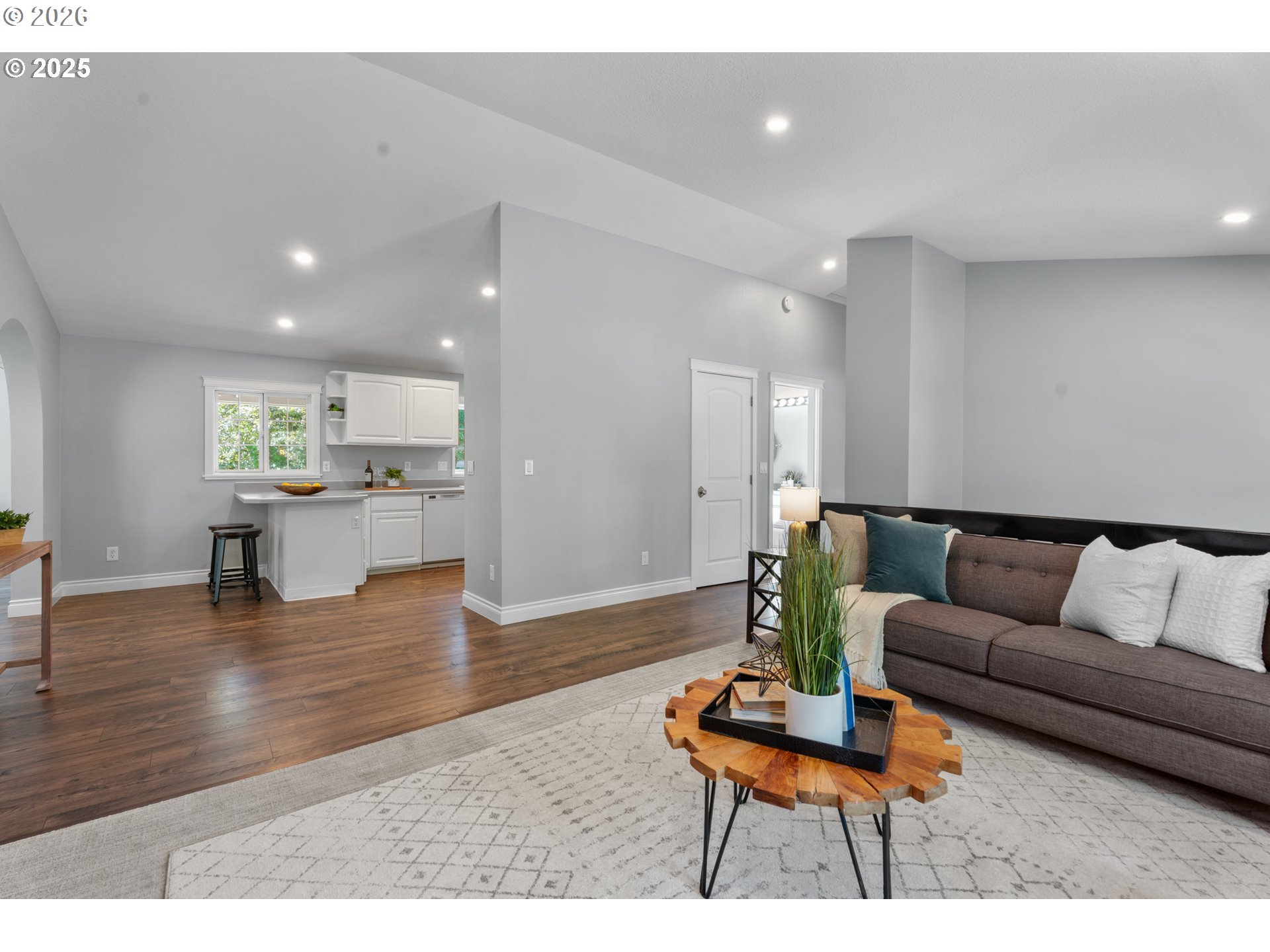 31150 Southwest Wallowa Court Wilsonville, OR 97070 - Photo 39 of 43 a living room with furniture and a wooden floor