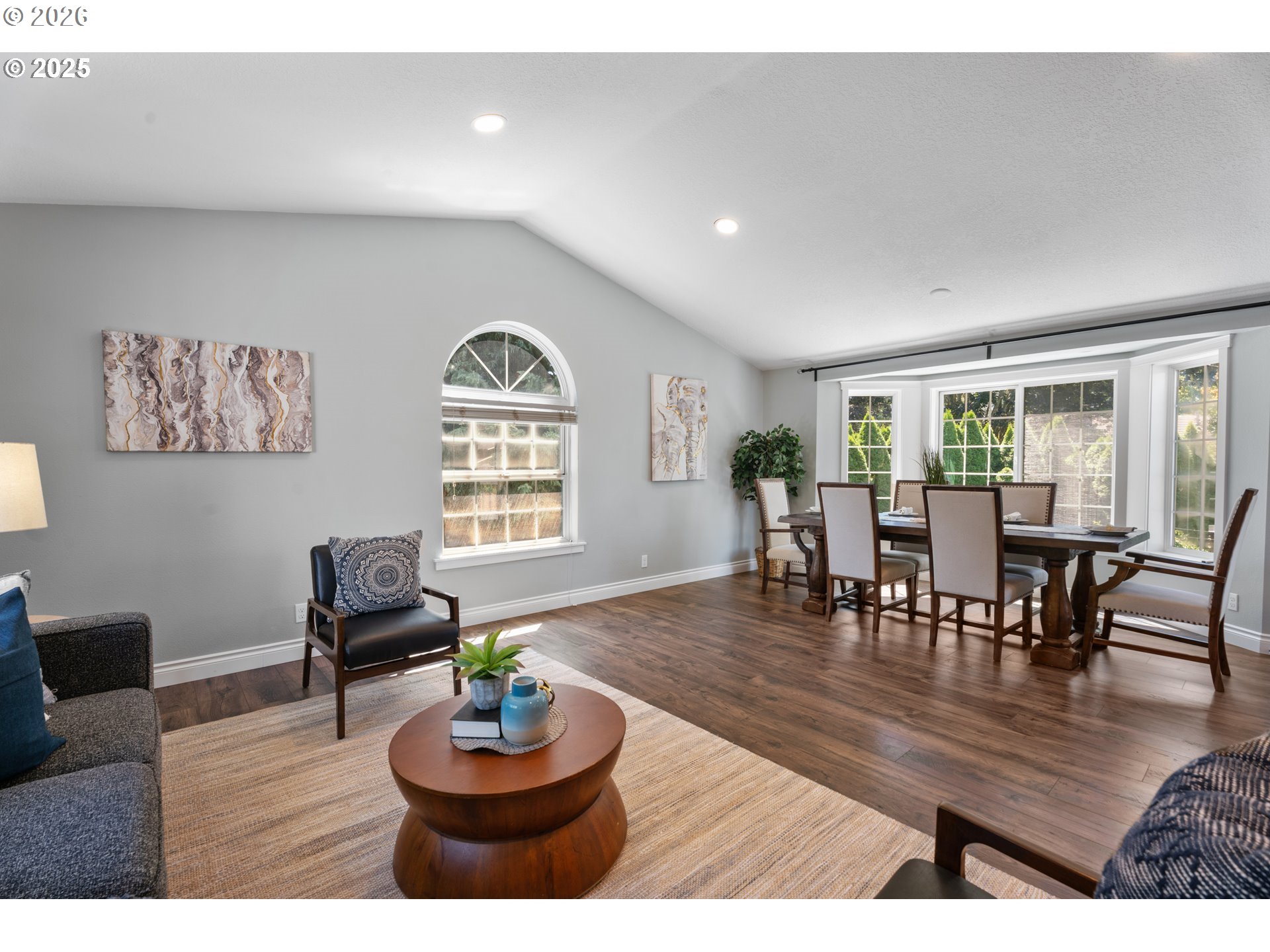 31150 Southwest Wallowa Court Wilsonville, OR 97070 - Photo 4 of 43 a view of a dining room with furniture window and wooden floor