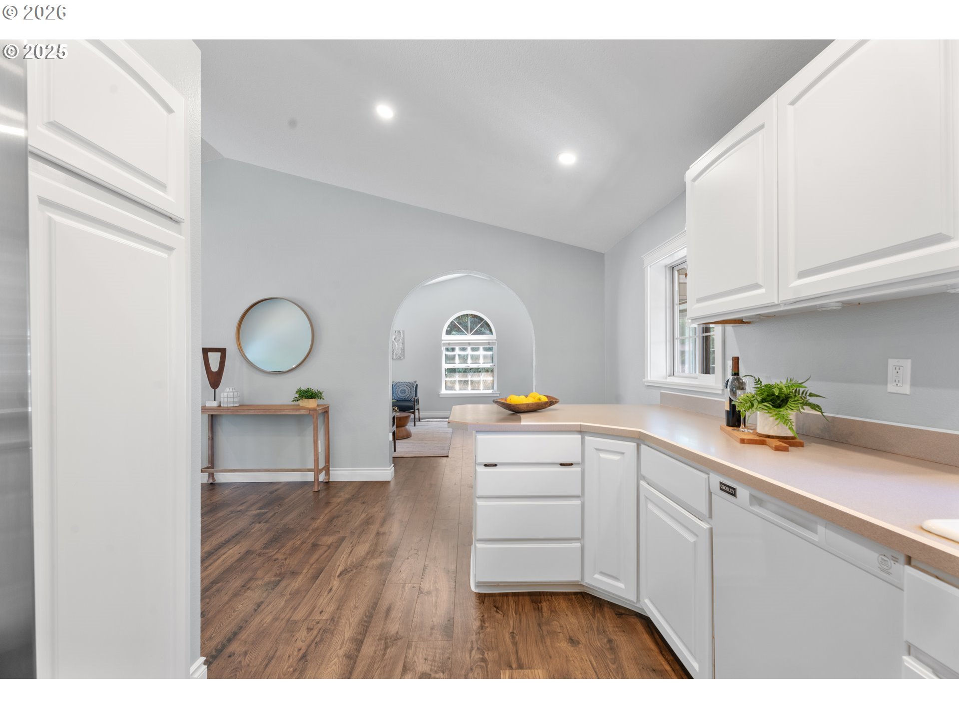 31150 Southwest Wallowa Court Wilsonville, OR 97070 - Photo 42 of 43 a kitchen with cabinets a sink and appliances