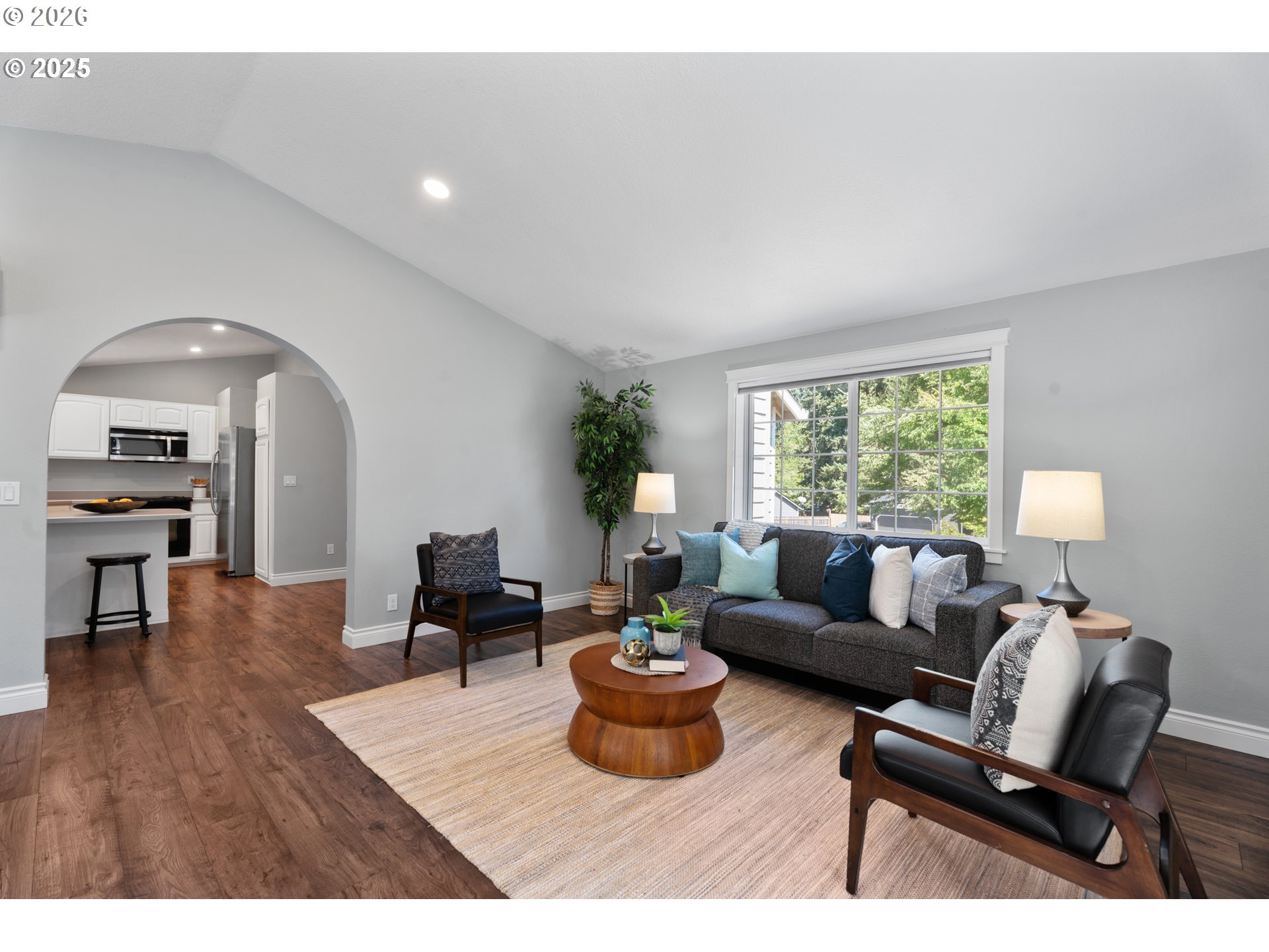 31150 Southwest Wallowa Court Wilsonville, OR 97070 - Photo 43 of 43 a living room with furniture and a wooden floor