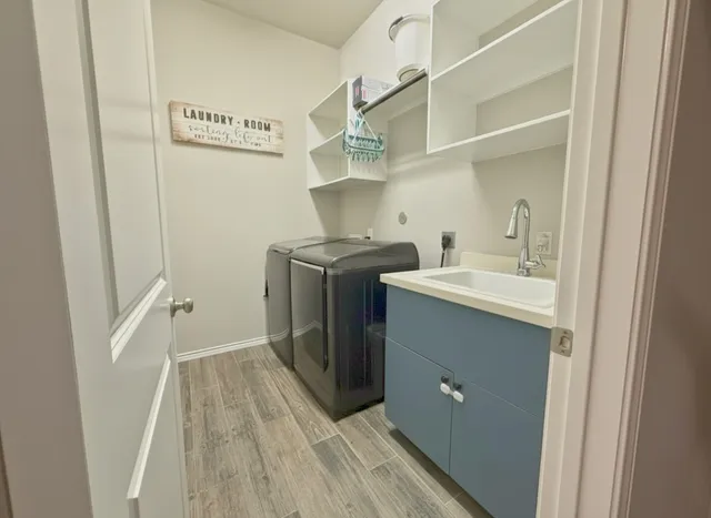 an empty room with closet and windows