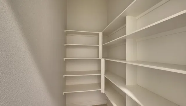 a gym room with lots of gym equipment