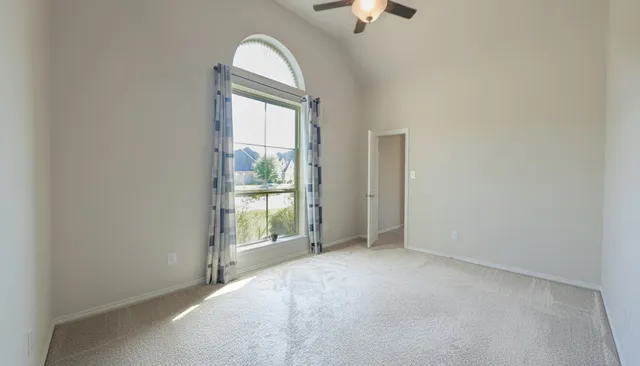 a bathroom with a sink a toilet a shower and a mirror