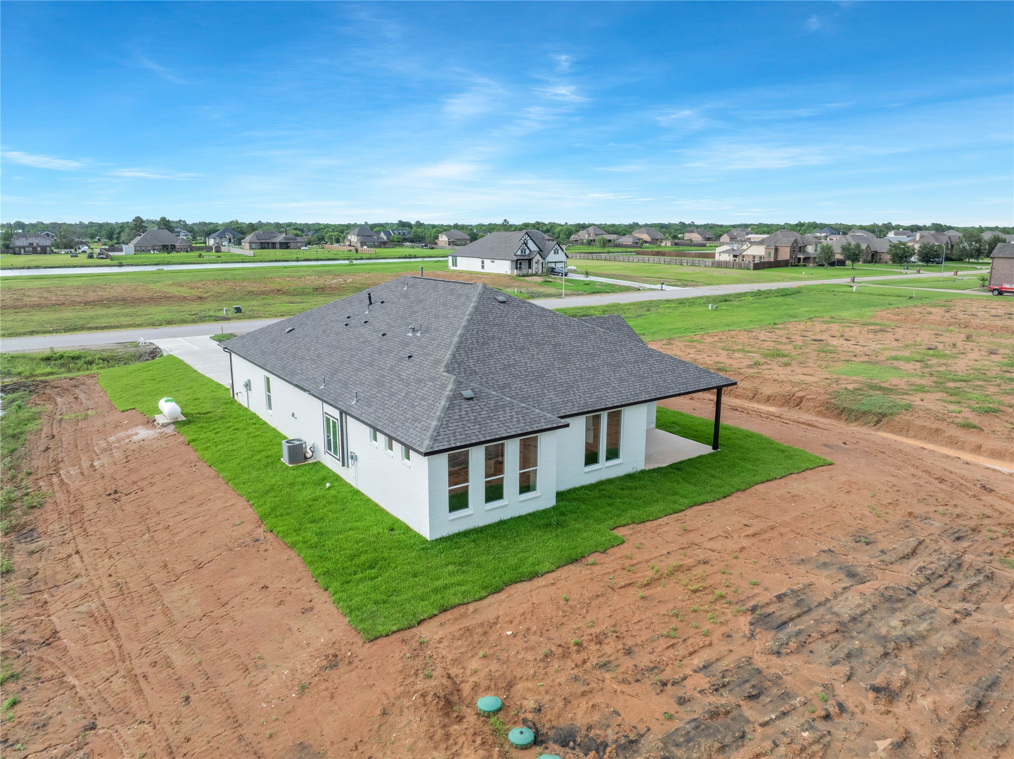 4610 Magnolia Bend Drive Rosharon, TX 77583 - Photo 45 of 48 an aerial view of a house with big yard and large trees