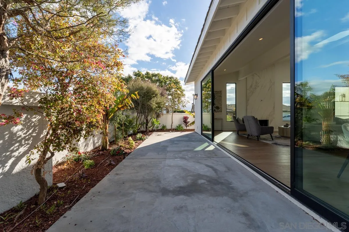34 Jetty Drive Corona del Mar, CA 92625 - Photo 17 of 33 a view of a house with backyard and tree