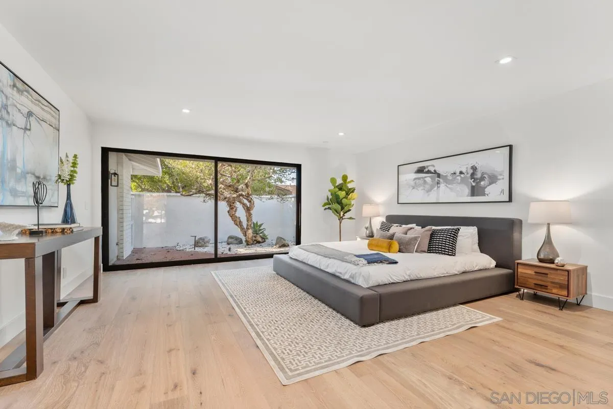 34 Jetty Drive Corona del Mar, CA 92625 - Photo 23 of 33 a living room with furniture and a large window