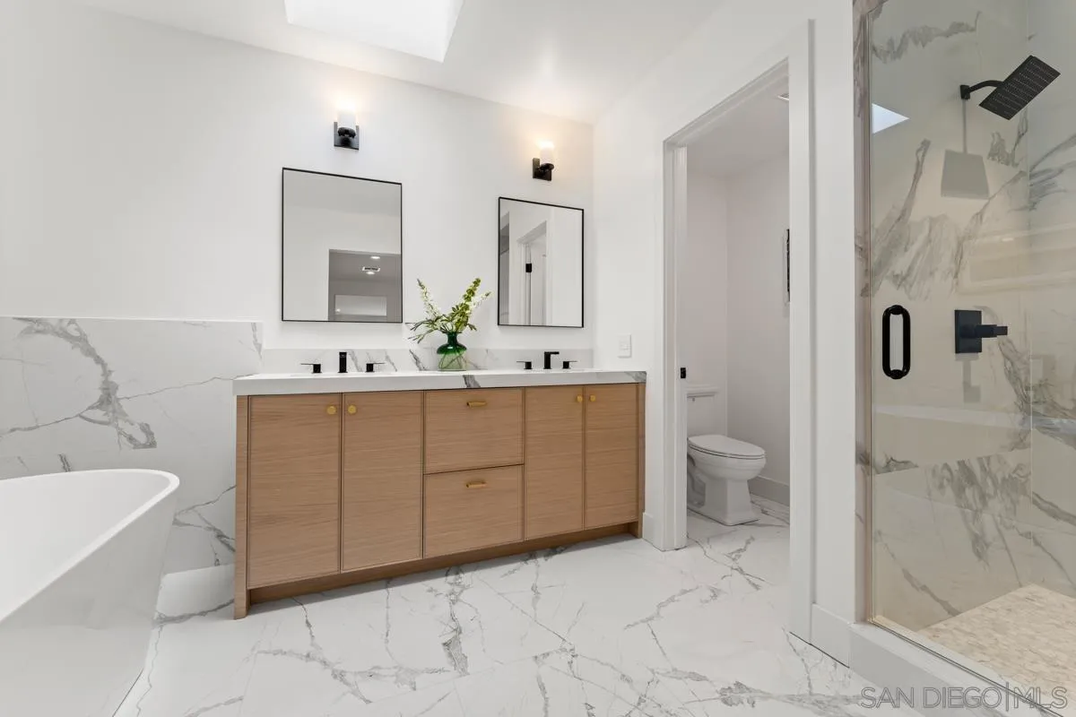 34 Jetty Drive Corona del Mar, CA 92625 - Photo 25 of 33 a bathroom with a sink toilet and shower