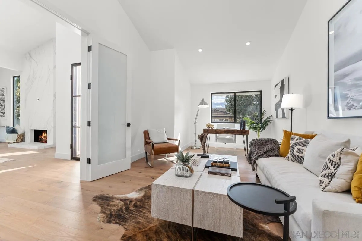 34 Jetty Drive Corona del Mar, CA 92625 - Photo 28 of 33 a living room with furniture and a large window