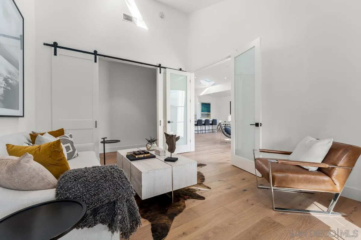 34 Jetty Drive Corona del Mar, CA 92625 - Photo 29 of 33 a living room with furniture and a table