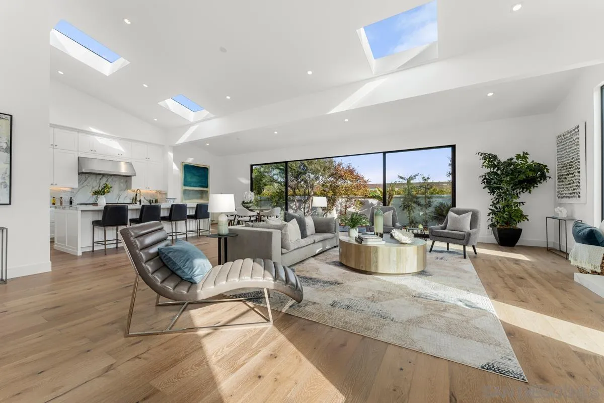 34 Jetty Drive Corona del Mar, CA 92625 - Photo 4 of 33 a dining room with furniture and a large window