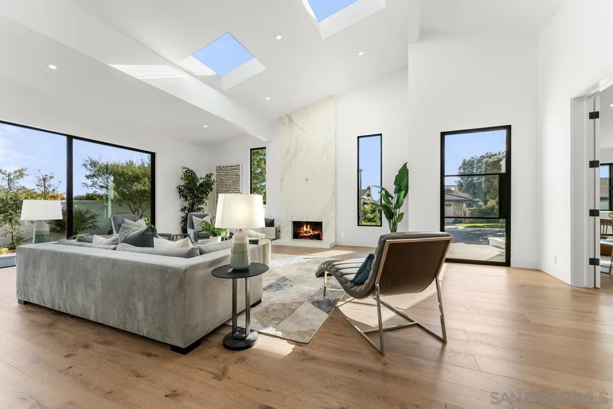 34 Jetty Drive Corona del Mar, CA 92625 - Photo 5 of 33 a living room with furniture and a large window