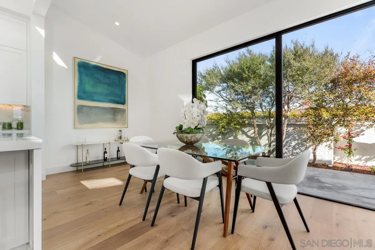 34 Jetty Drive Corona del Mar, CA 92625 - Photo 9 of 33 a view of a dining room with furniture window and wooden floor