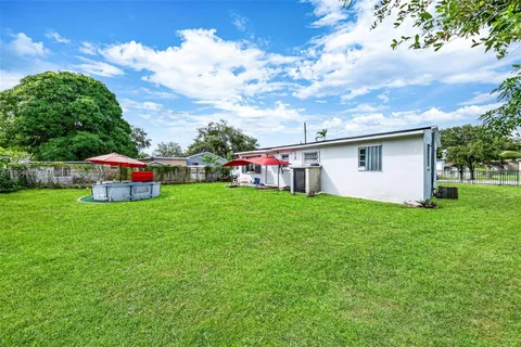 a house view with a garden space