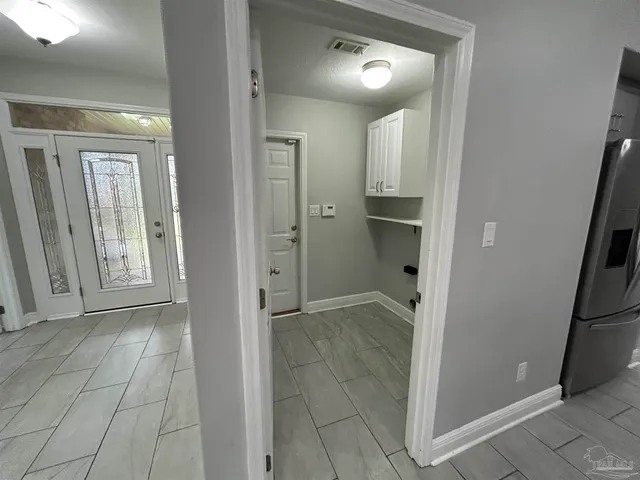 an empty room with windows